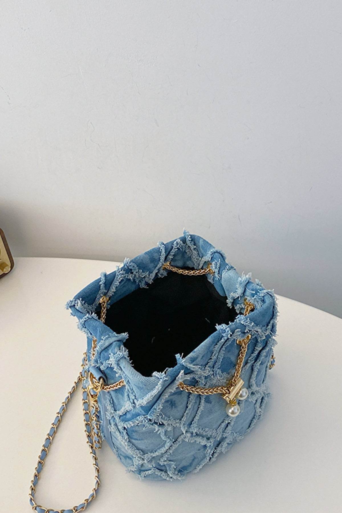 Chain Drawstring Raw Edge Denim Bucket Bag - Hovatok