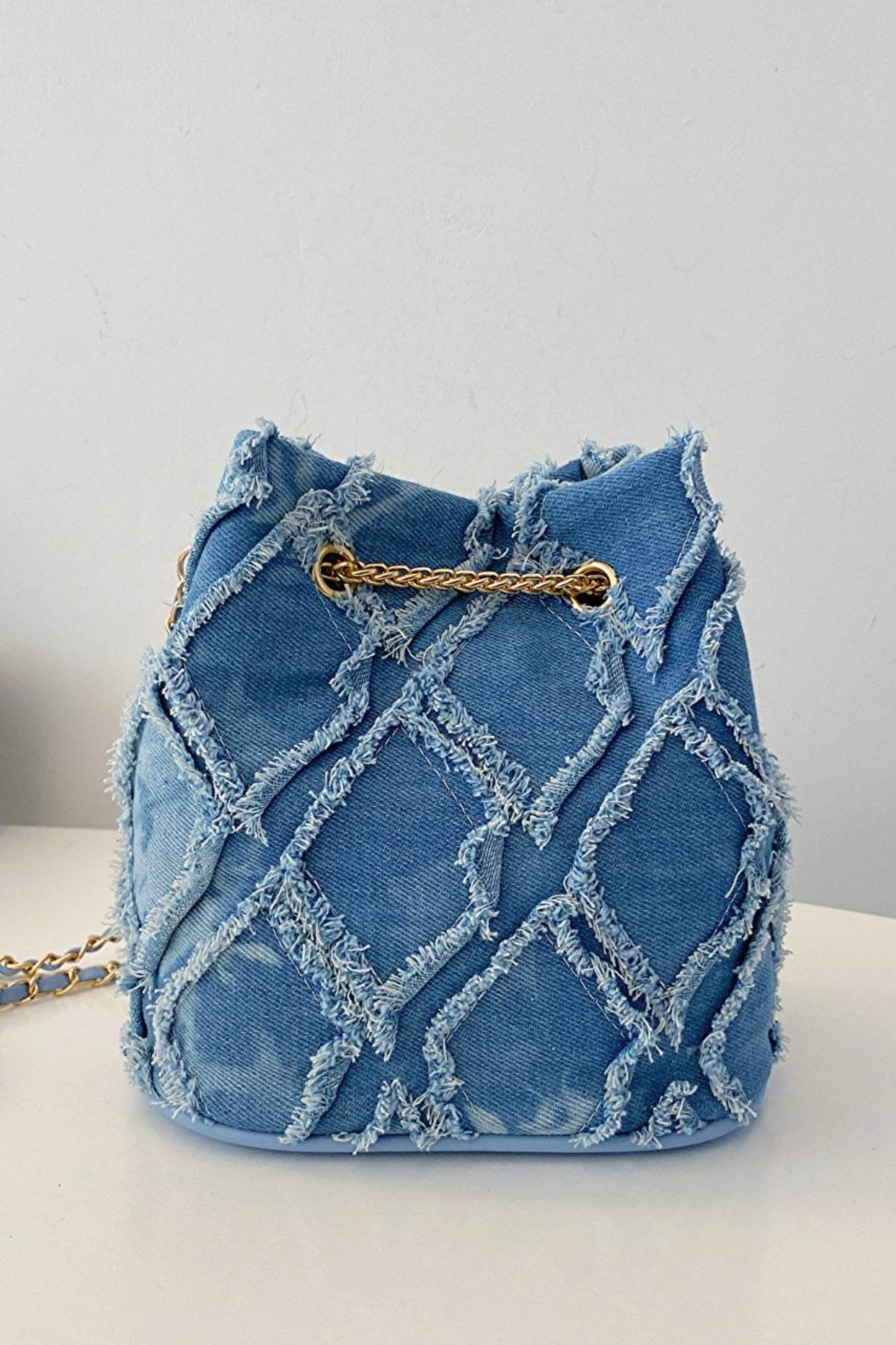 Chain Drawstring Raw Edge Denim Bucket Bag - Hovatok