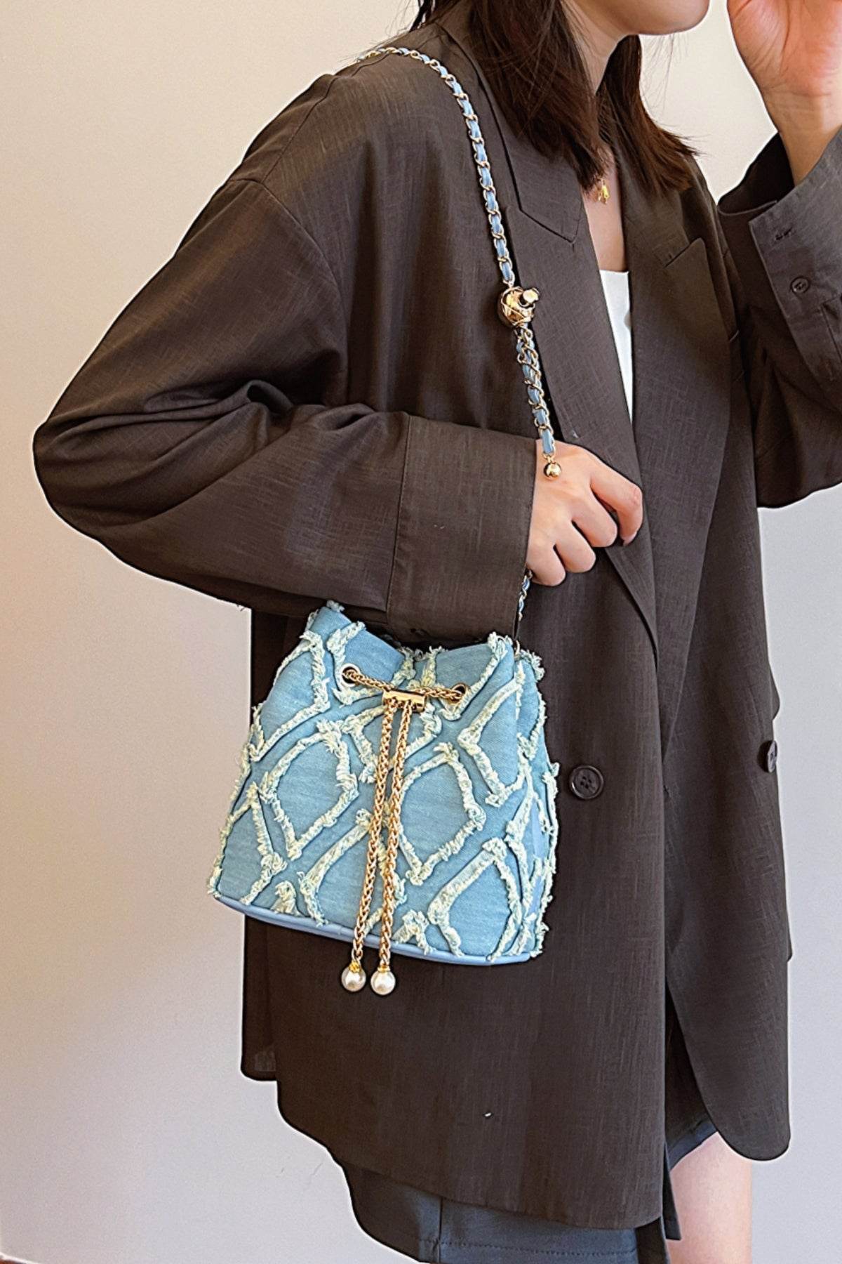 Chain Drawstring Raw Edge Denim Bucket Bag - Hovatok