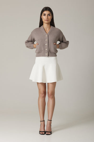 CHELSIE CIRCULAR KNIT MINI SKIRT IN SUGAR
