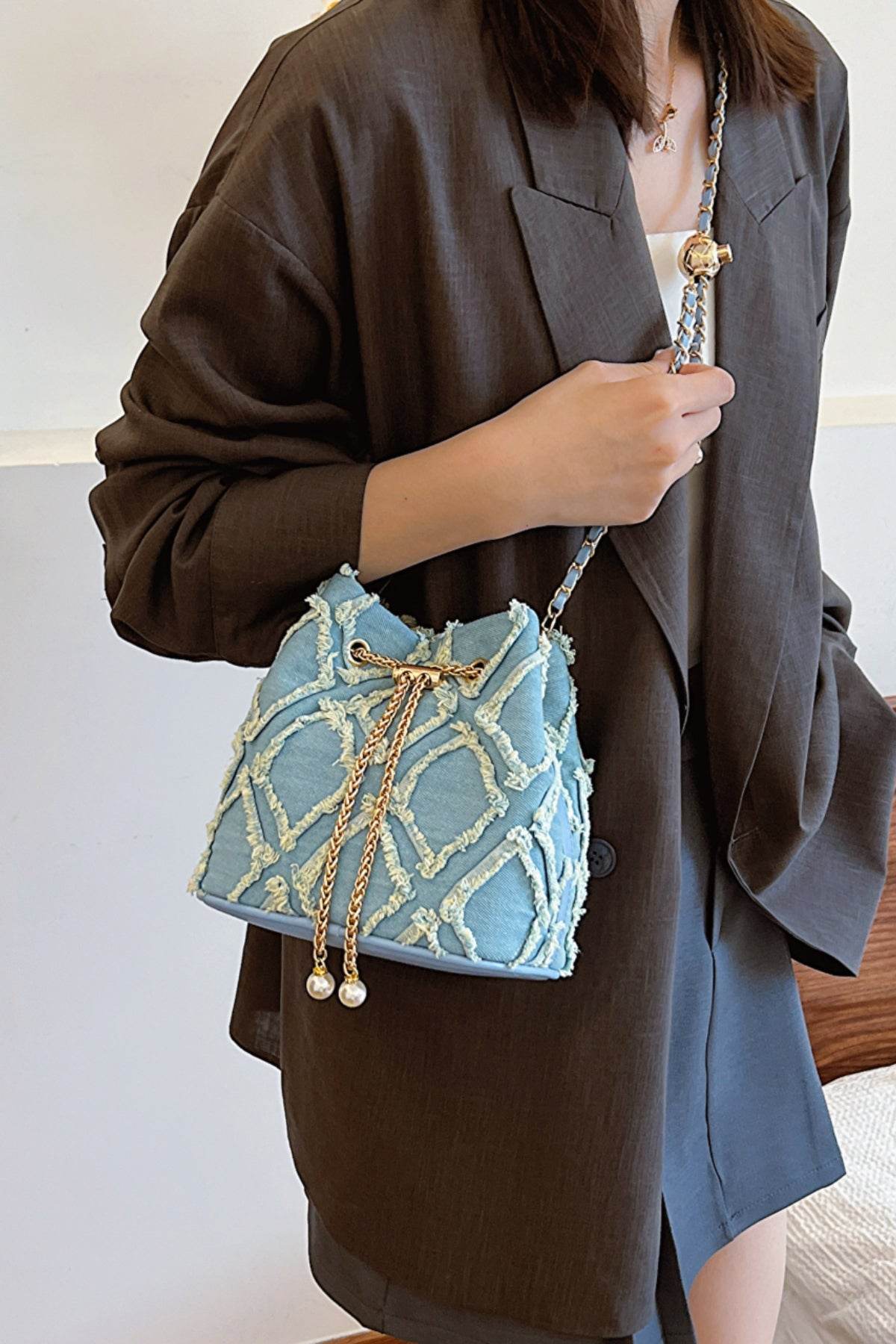 Chain Drawstring Raw Edge Denim Bucket Bag - Hovatok