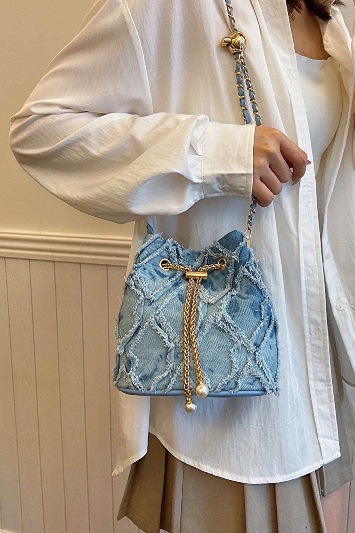 Chain Drawstring Raw Edge Denim Bucket Bag - Hovatok