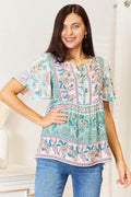 Perfee Floral Tie Neck Short Sleeve Blouse - Hovatok