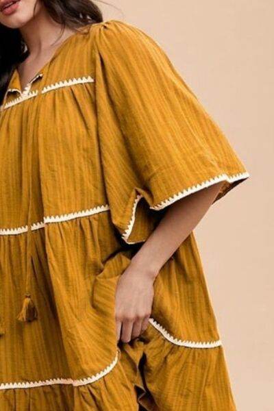 Annie Wear Tassel Contrast Trim Tie Neck Half Sleeve Tiered Dress - Hovatok