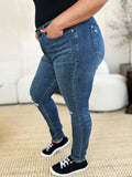 Judy Blue Full Size Mid Waist Distressed Slim Jeans - Hovatok