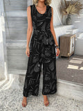 Devine Printed Round Neck Sleeveless Tie Waist Jumpsuit - Hovatok