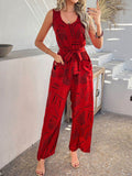 Devine Printed Round Neck Sleeveless Tie Waist Jumpsuit - Hovatok