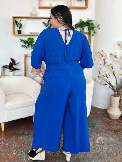 Double Take Full Size Surplice Wide Leg Jumpsuit with Pockets - Hovatok