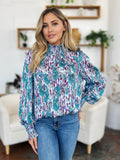 Double Take Full Size Printed Smocked Long Sleeve Blouse - Hovatok