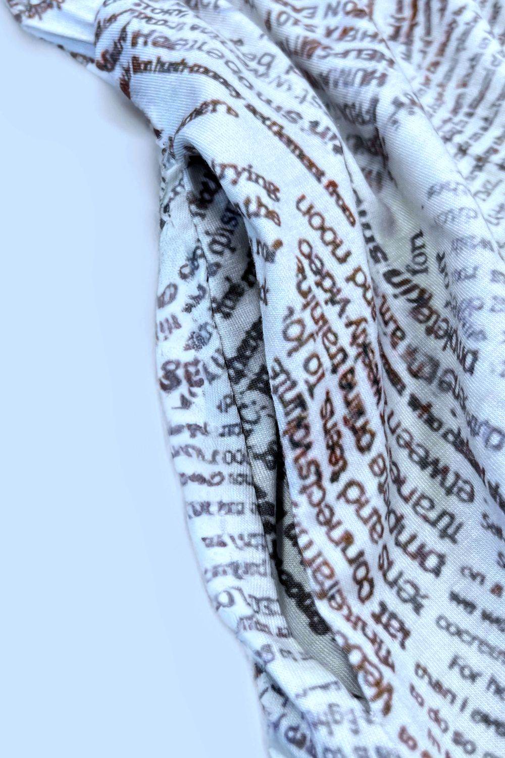 Double Take Printed Scoop Neck Sleeveless Buttoned Magic Dress with Pockets - Hovatok