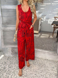 Devine Printed Round Neck Sleeveless Tie Waist Jumpsuit - Hovatok