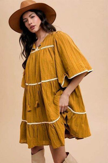 Annie Wear Tassel Contrast Trim Tie Neck Half Sleeve Tiered Dress - Hovatok