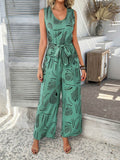 Devine Printed Round Neck Sleeveless Tie Waist Jumpsuit - Hovatok