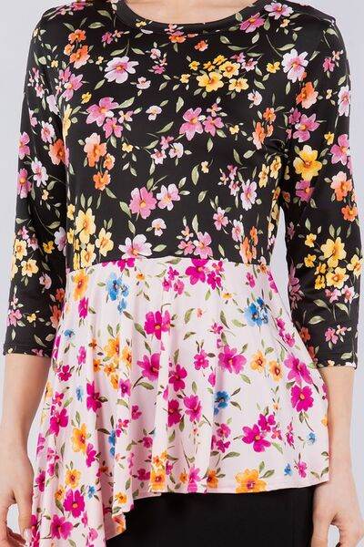 Celeste Full Size Floral Asymmetrical Hemline Round Neck Top Plus Size - Hovatok
