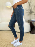Judy Blue Full Size Mid Waist Distressed Slim Jeans - Hovatok