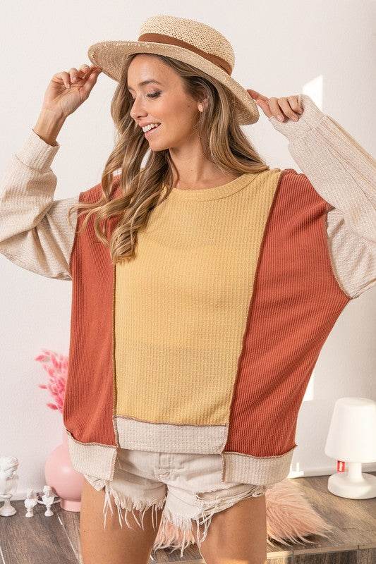 BiBi Waffle-Knit Exposed Seam Color Block Uneven Hem Top - Hovatok