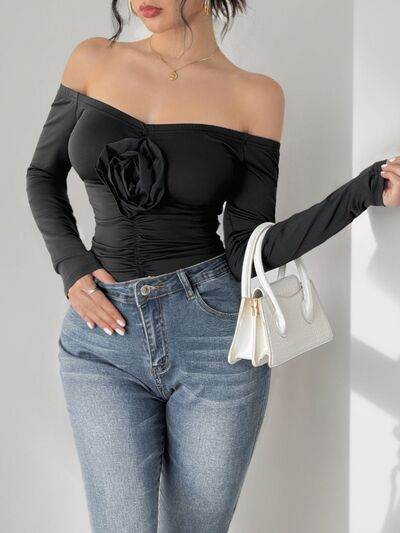 Perfee Ruched Flower Off-Shoulder Long Sleeve Bodysuit - Hovatok