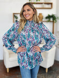 Double Take Full Size Printed Smocked Long Sleeve Blouse - Hovatok
