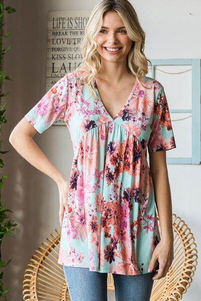 Heimish Full Size Floral V-Neck Short Sleeve Babydoll Blouse - Hovatok