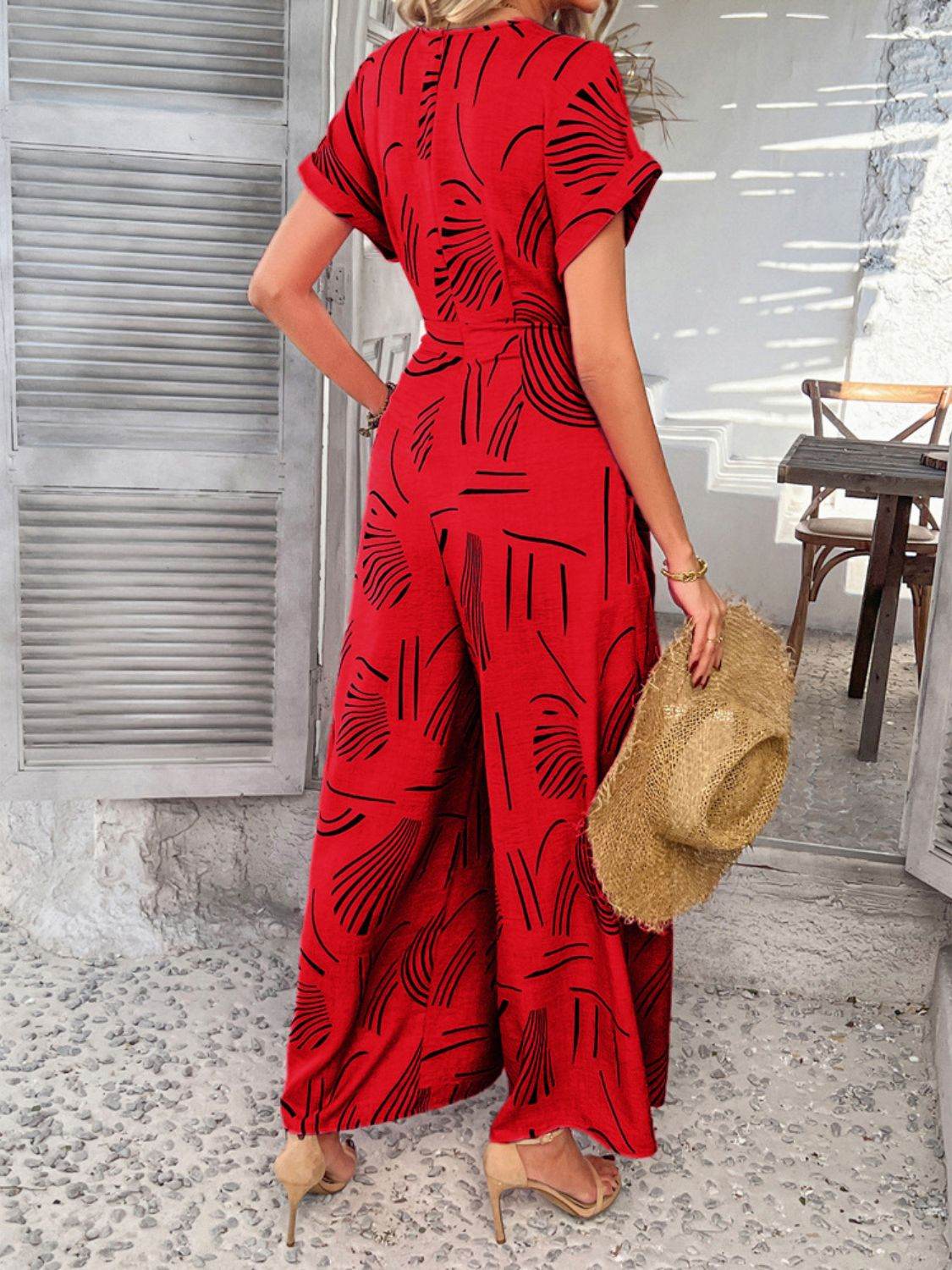 Devine Printed Notched Short Sleeve Wide Leg Jumpsuit - Hovatok