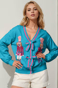 Double Take Full Size Nutcracker Sequin Bow Decor Cardigan - Hovatok