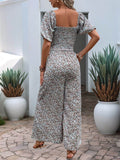 Perfee Ditsy Floral Smocked Square Neck Puff Sleeve Jumpsuit - Hovatok