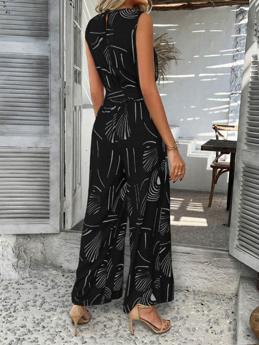 Devine Printed Round Neck Sleeveless Tie Waist Jumpsuit - Hovatok