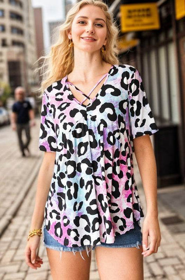 Heimish Full Size Crisscross Neck Animal Print Babydoll Top Plus Size - Hovatok