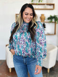 Double Take Full Size Printed Smocked Long Sleeve Blouse - Hovatok