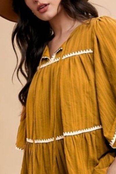 Annie Wear Tassel Contrast Trim Tie Neck Half Sleeve Tiered Dress - Hovatok