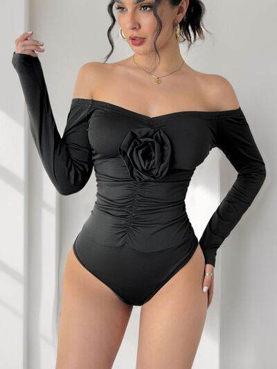 Perfee Ruched Flower Off-Shoulder Long Sleeve Bodysuit - Hovatok