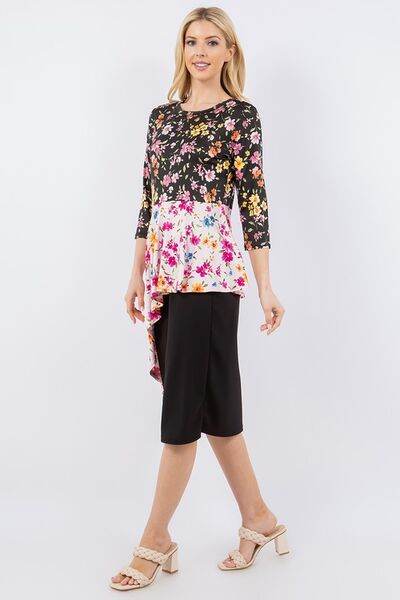 Celeste Full Size Floral Asymmetrical Hemline Round Neck Top Plus Size - Hovatok