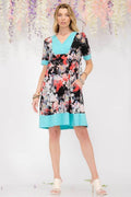 Celeste Full Size Floral Surplice Short Sleeve Dress with Pockets Plus Size - Hovatok