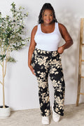 Heimish Full Size High Waist Floral Flare Pants - Hovatok