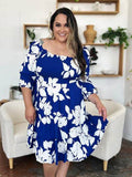 Double Take Full Size Floral Ruffle Hem Smocked Dress with Pockets - Hovatok