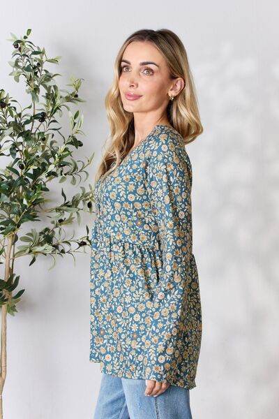 Heimish Full Size Floral Half Button Long Sleeve Blouse - Hovatok