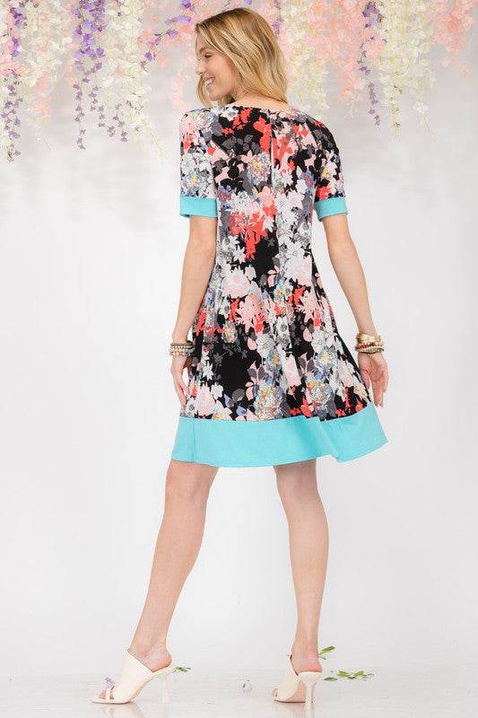 Celeste Full Size Floral Surplice Short Sleeve Dress with Pockets Plus Size - Hovatok