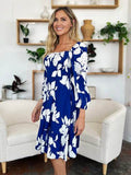 Double Take Full Size Floral Ruffle Hem Smocked Dress with Pockets - Hovatok