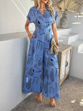 Devine Printed Notched Short Sleeve Wide Leg Jumpsuit - Hovatok
