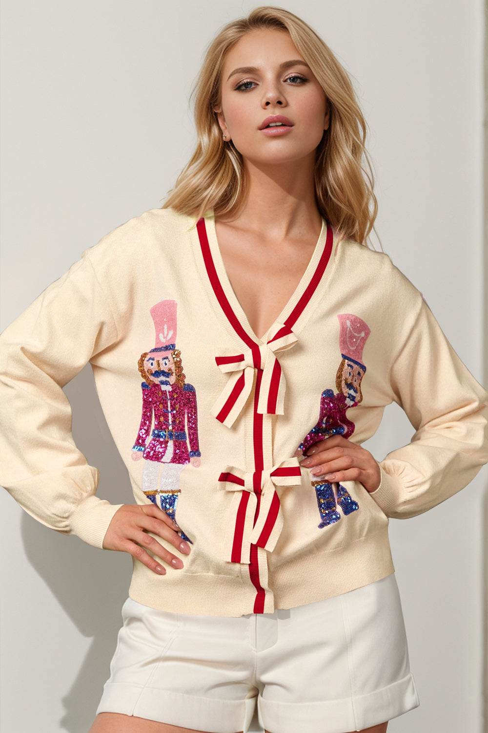 Double Take Full Size Nutcracker Sequin Bow Decor Cardigan - Hovatok