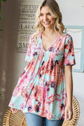 Heimish Full Size Floral V-Neck Short Sleeve Babydoll Blouse - Hovatok